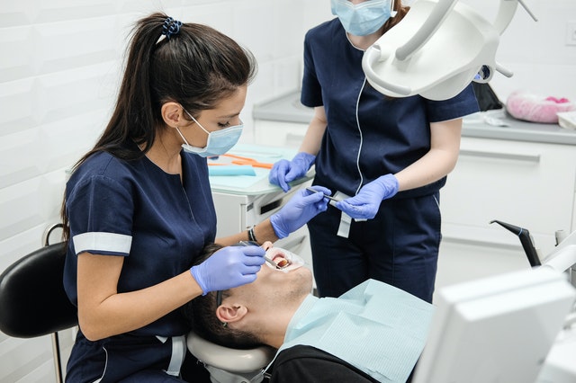 Dentist doing a wisdom teeth removal in Hawkesbury